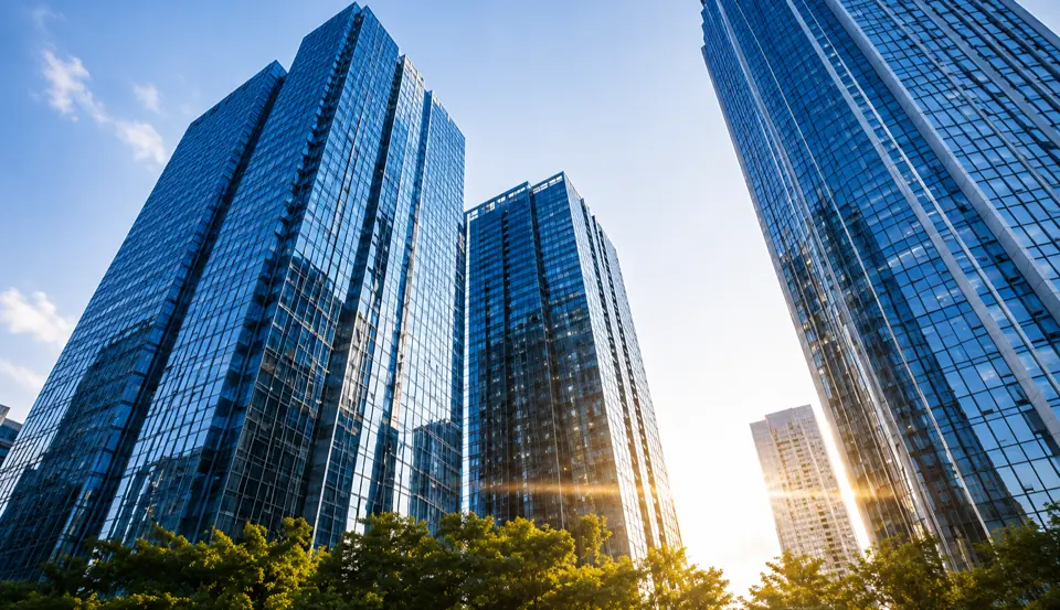Glass office towers seen from street level