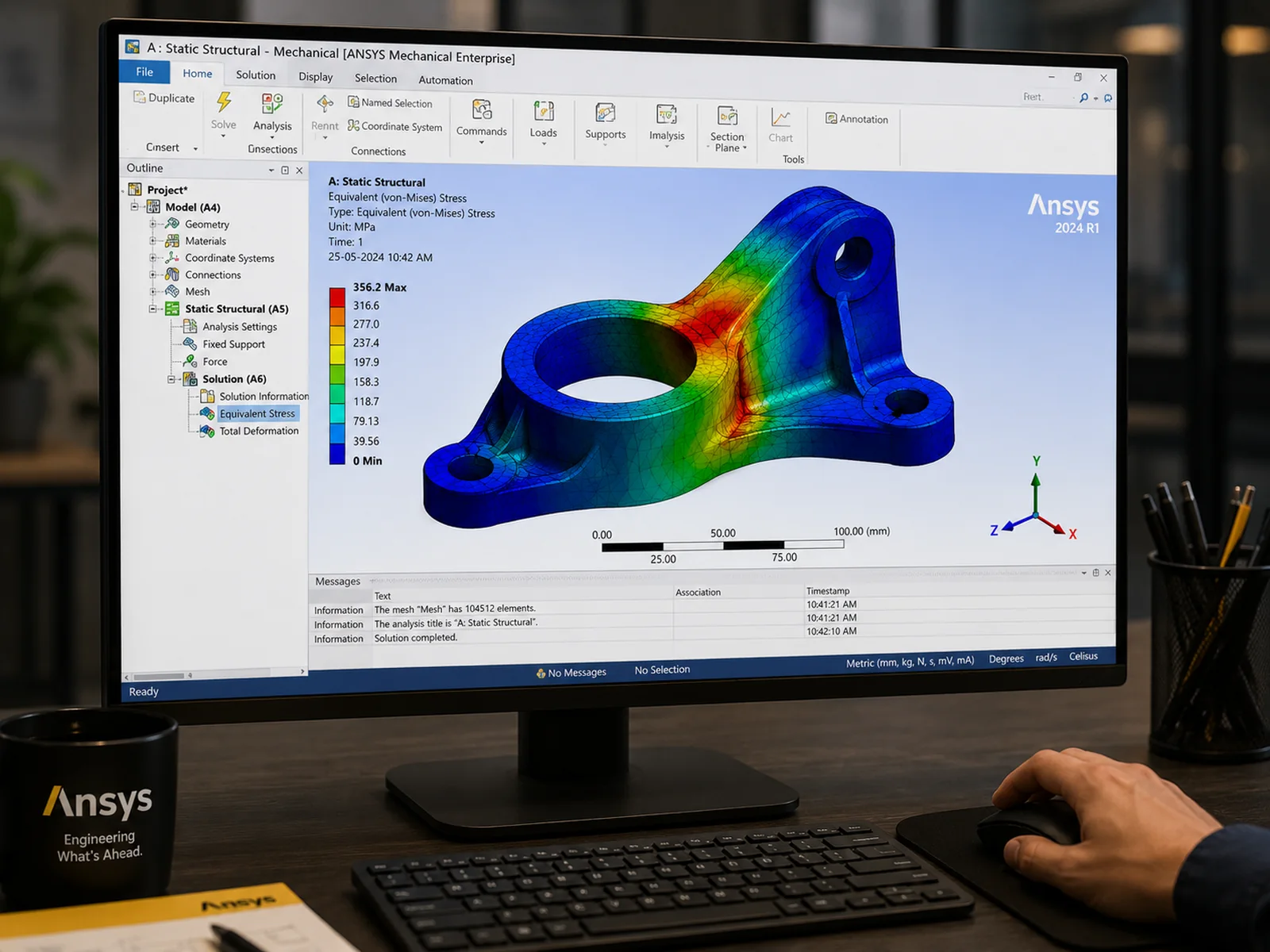A static structural analysis in Ansys Mechanical showing von Mises stress on a bracket as a colour contour with its scale, mesh and results tree