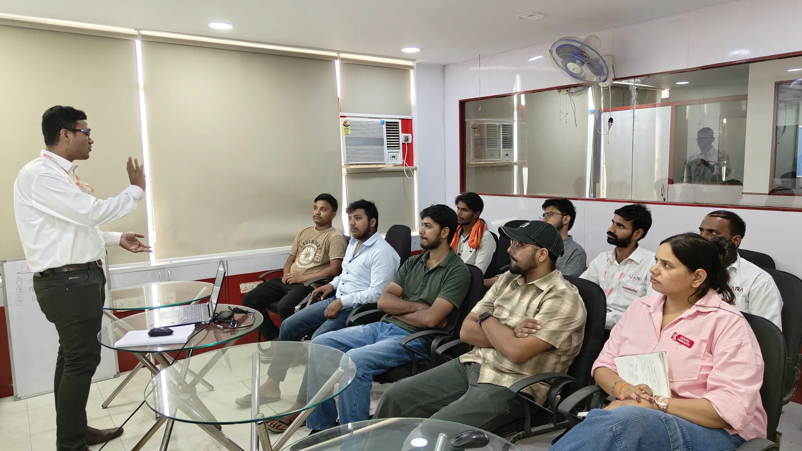 A speaker talking to a seated group of learners at CADD Centre Gurugram, Sector 14